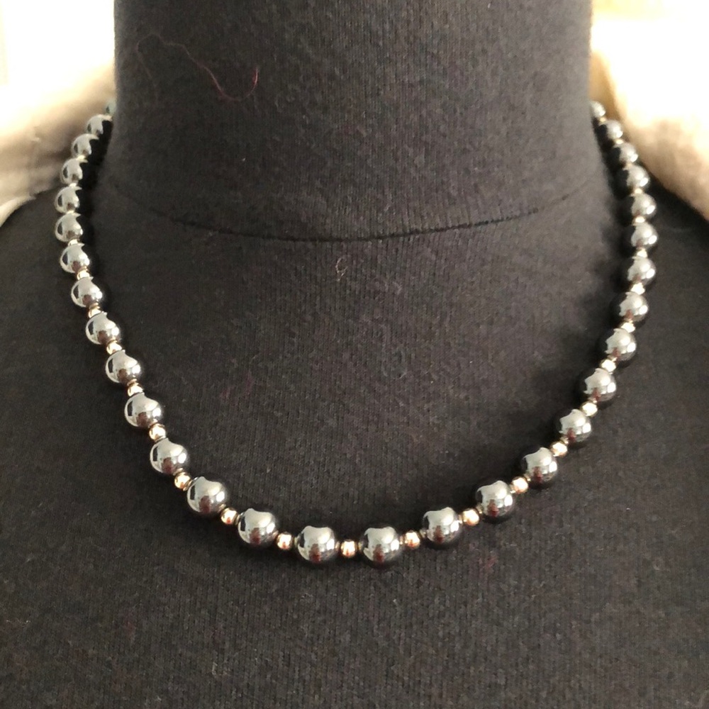 Vintage gray Hematite With gold tone beads.